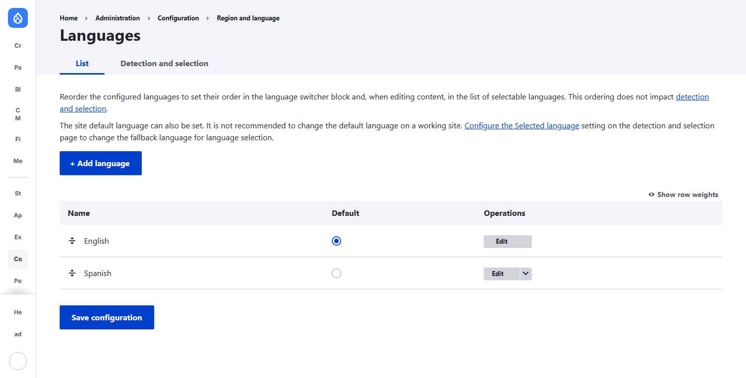 Drupal Languages admin page listing English (default) and Spanish.